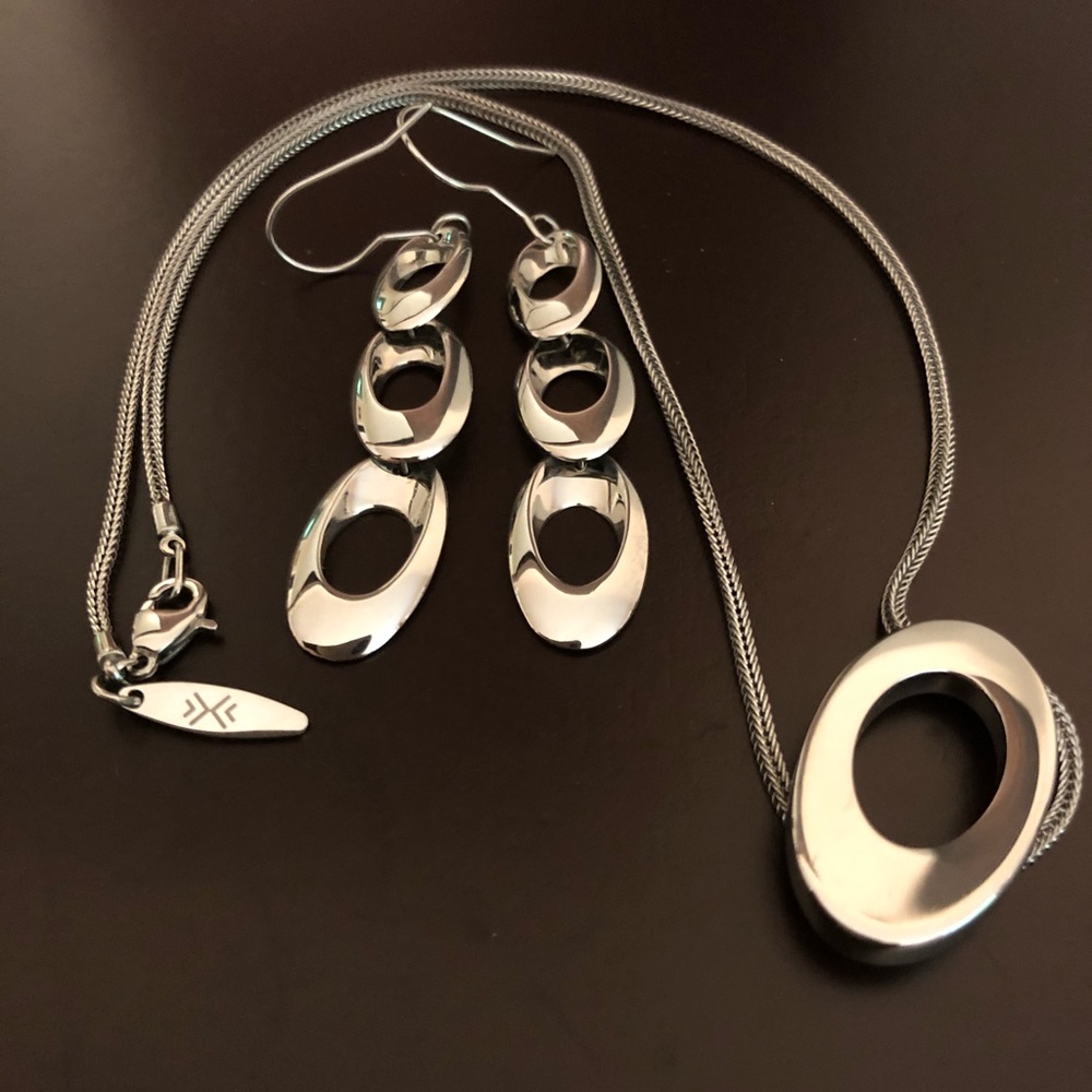 Like new sterling silver necklace and earrings